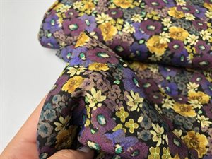 Fastvævet viscose - flotte blomster i lilla og gule toner